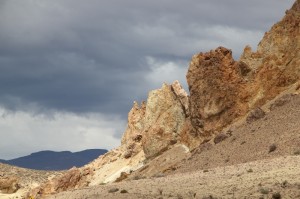 eroded rocks against dark sky