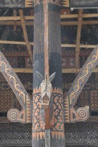 support pole extensively decorated