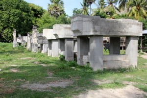 row of tombs in Umabara, the first ones, of concrete, still unadorned, awaiting a deceased king