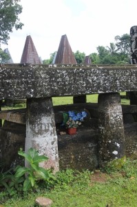 plastic flowers decorate the tomb in Kampung Pasunga