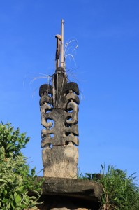 decorated stone sculpture in the centre of Kampung Waigalli