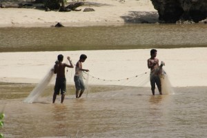 fishermen active along the beach