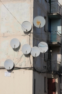 bunch of satelite dishes, outside one of the palatis