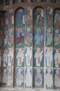 frescoes on the outside of the sanctuary