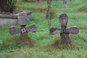 simple wooden crosses in the Sat Sugatag churchyard