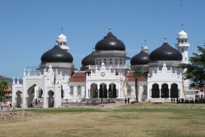 no less than seven domes and eight minarets, added over time