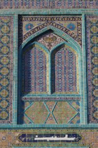 tiled decoration on the outside of the mosque
