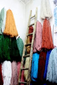 one of the merchandise is wool, in any colour