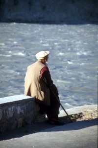 man contemplating the Gilgit river