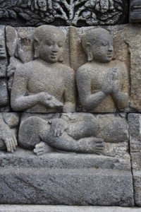 bas-relief of two novice monks
