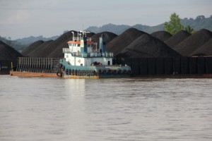 coal barges and a towing boat alongside