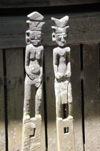 wooden statues at the longhouse cum losmen in Tanjung Isuy