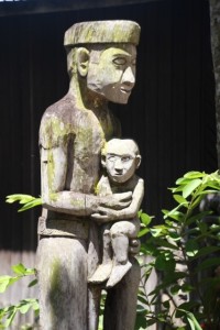 one of the patongs - wooden statues - outside the longhouse