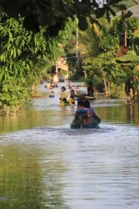 a street in Tering Lama under water, calling for canoe use
