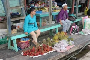 rambutan and durian for sale at a river stop in Datan Bilang