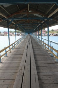 the covered bridge across the Poso River in Tentana
