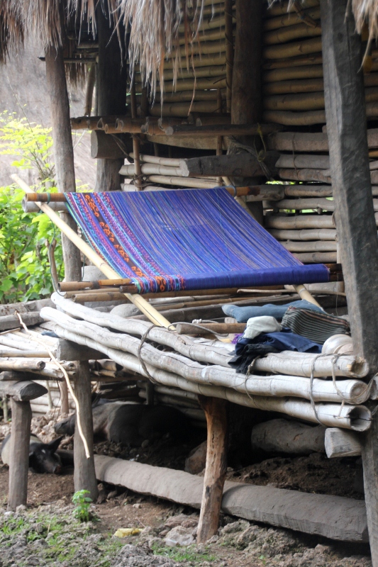 here, too, ikat weavings bring some colour to the village