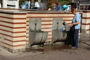 near the haman is also a public water supply, lots of people collect their water from here, in plastic bottles