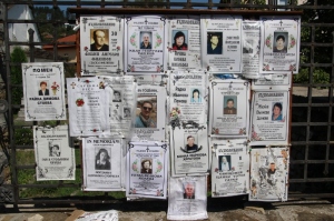 an interesting Bulgarian practice: posters of the deceased next to the church