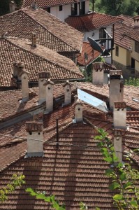 roofs and chimneys, solar panels and a satelite dish