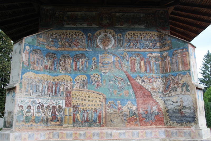 impressive Last Judgement fresco on the side of Voronet monastry church
