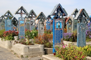 blue crosses with poems and images in the Merry Cemetery in Sapanta