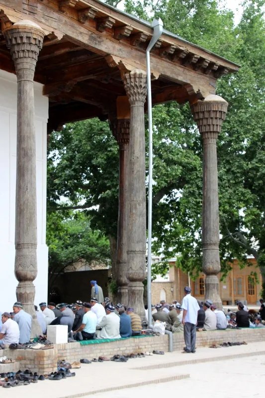 men praying in the Dorus Sidiat mosque, still an active mosque