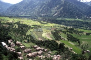 agricultural fields and wooden villages in the valley