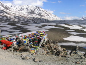 prayer flags along the road, crossing a high plateau (courtesy Gijs Remmelts)