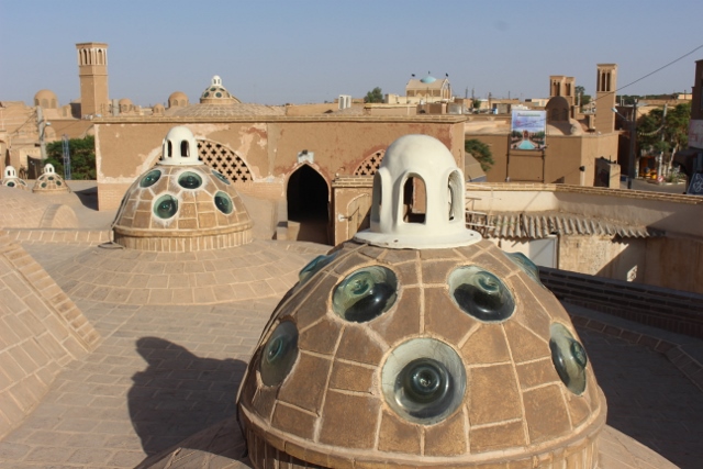 on the roof of the Hamman-e Sultan Mir Ahmad, each cupola provides light downstairs in one of the many rooms