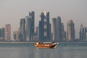 Doha skyline, and a traditional dhow in front
